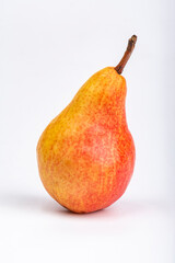 Red and yellow pear on a white background