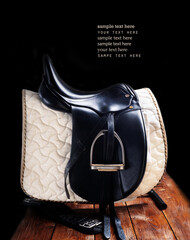 Black professional  leather dressage saddle in complete with nice saddle cloth and girth puted at...