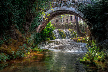 Bridge, waterfalls, river at the old town of Livadeia, in Boeotia region, Central Greece, Greece.