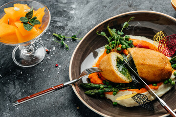 Chicken Kiev, breaded chicken breast stuffed with herbs and butter. cutlet breast with mashed...