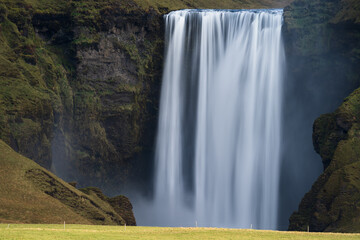 Long exposure of famous Skogafoss waterfall in Iceland from the distance