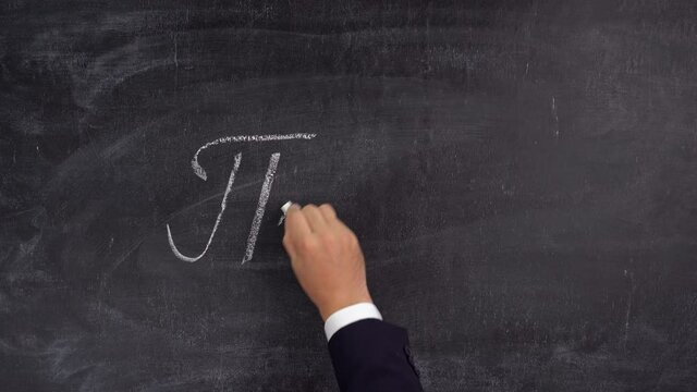 The teacher's hand writes the number Pi = 3.14 on the blackboard