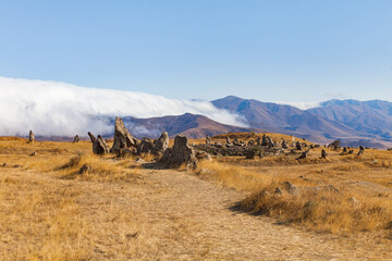Standing stones in Zorats-Karer or Karahunj. Ancient megalithic complex, Syunik region of Armenia.