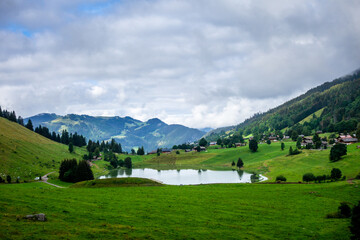 Fototapeta na wymiar Lake of the Confins and Mountain landscape in La Clusaz, France