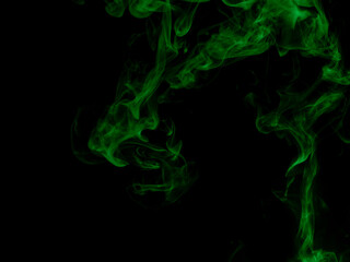 Chaotic mixing smoke creates abstract patterns on a black background