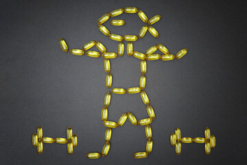 Muscular character with dumbbells made from fish oil pills