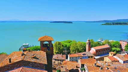 panoramic view over Lake Trasimeno from the medieval fortress of Passignano sul Trasimeno in Perugia, Umbria, Italy