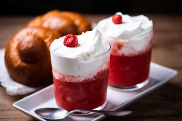 Delicious breakfast with strawberry granita and brioches