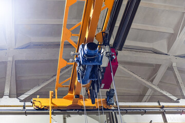 Working electric drive of an overhead crane in a metalworking workshop.
