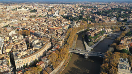 Fototapeta na wymiar Aerial drone photo of Tiber island or Isola Tiberina, a small island in a bend of the River Tiber with a number of historical buildings and monuments, Rome historic centre, Italy