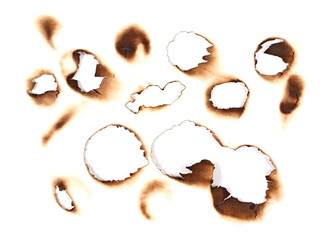 Set of burnt holes of paper, texture and background, top view