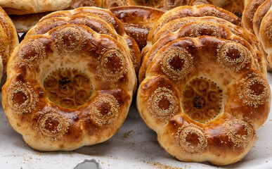 Uzbekistan, delicious traditional uzbek bread. - obrazy, fototapety, plakaty