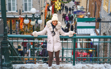 Fototapeta premium Portrait of a beautiful young model on a winter season with coat