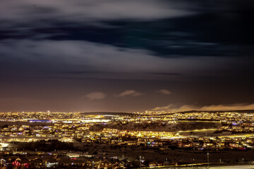 Fototapeta na wymiar Winter night panorama of Hafnarfjordur city, Iceland. 