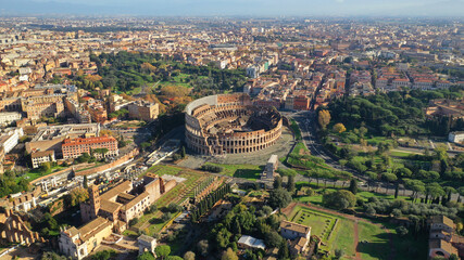 Aerial drone photo of iconic ancient Roman Gladiatorial arena world famous Colosseum, Rome historic centre, Italy - obrazy, fototapety, plakaty