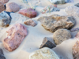 stones lie in the sand. View from above
