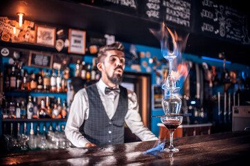 Barman creates a cocktail on the taproom
