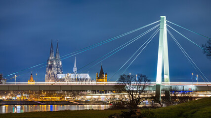 Famous Cologne Cathedral illuminated against dark winter sky