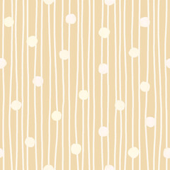 Rough white polka dot and uneven vertical stripes on beige. Seamless pattern. For packaging design, scrapbooking, cards, gift wrap, digital backgrounds, textile and wallpaper...