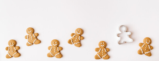 Banner made of Homemade gingerbread cookies on white background. Christmas, winter, new year composition. Flat lay, top view, copy space