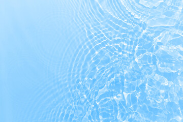 Fresh water background. Bright blue pattern with natural rippled water texture. Clear drinking water., sport hydration concept. Top view with copy space.