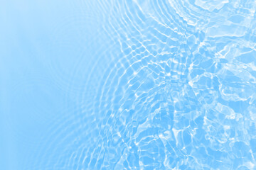 Fresh water background. Bright blue pattern with natural rippled water texture. Clear drinking...