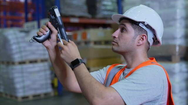 Business concept of 4k Resolution. Employees are collecting product information into the system. barcode scanner.