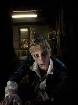 Zombie walking out of a decrepit apartment