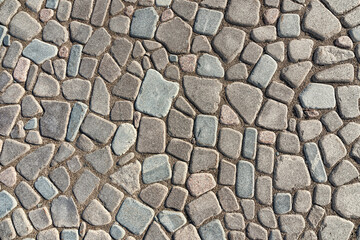 The texture of natural stone paving, background.