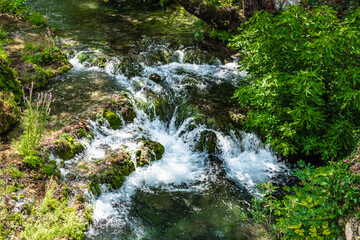 A small waterfall in a mountain stream
