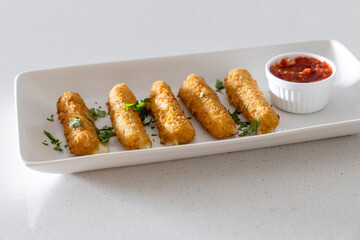 Eating Deep Fried Mozzarella Cheese Sticks