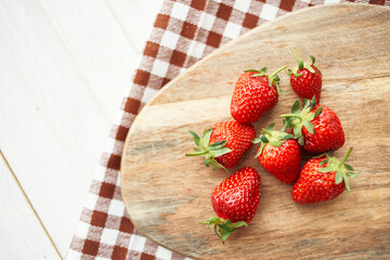 fresh strawberries on wooden board fruit vitamins summer