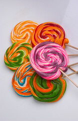 Lollipops. Colorful handmade lollipops on white background.