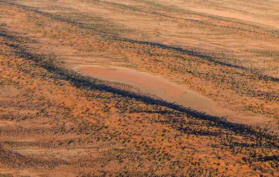 Abstract birds eye view of a dry arid landscape from central South Australia. Aerial images over the Painted Desert, Dry Creek Beds, and scrub bushland