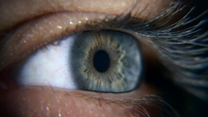 Close up Open Blue Female Eyes. Human Pupil Cornea Iris Eyeball Eyelashes. Macro Shot. 2x Slow motion 60 fps 4K