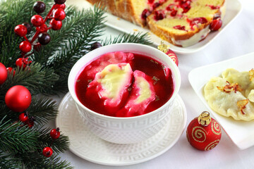 Red borscht with dumplings - traditional Polish Christmas Eve dish
