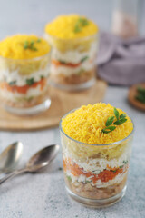 Mimosa salad in transparent glass	
