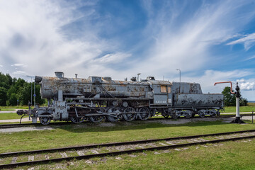 Ancient steam locomotive at railway station in summer, Haapsalu, Estonia