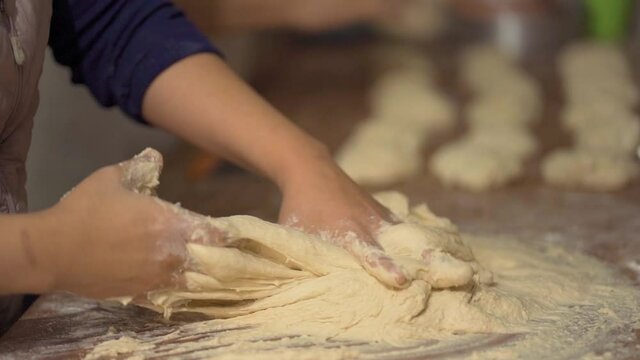 Mexican pastry chef preparing salt bread