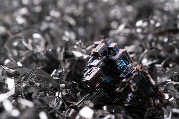 Perfect bismuth crystals macro on metal shavings.