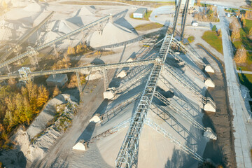 Conveyor belts discharge a lot of sand, large heaps of sand