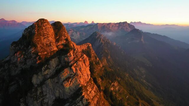 Aerial Forward Beautiful Shot Of Cape Au Moine Mountains During Sunset
