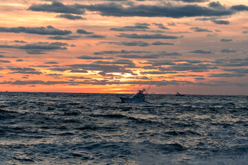 Fishing boat at sunrise of the New Jersey Coastline