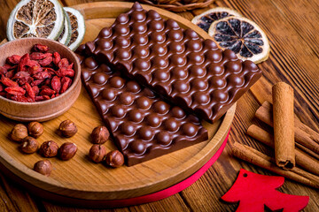 Composition of chocolate, milk chocolate in the form of bubbles