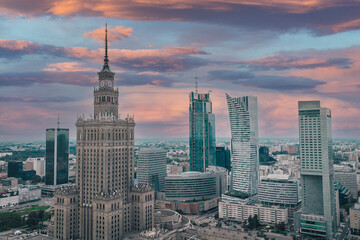 Aerial view of palace of art and culture in Warsaw, Poland on a cloudy and rainy afternoon. wide panorama of beautiful portrait of polish historical sight