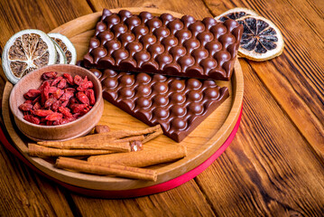 Composition of chocolate, milk chocolate in the form of bubbles