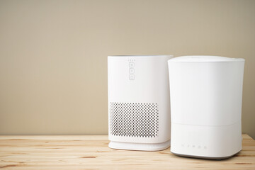Modern humidifier and air purifier, space for text. - obrazy, fototapety, plakaty
