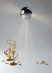 Mirrorball with Champagne glasses and ribbons.