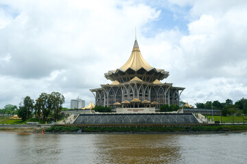 "Kuching, Malaysia-Circa December, 2021: A picture of Dewan Undangan Negeri or Sarawak State Assembly Complex with river and cloud insight. Sarawak is preparing for state election."