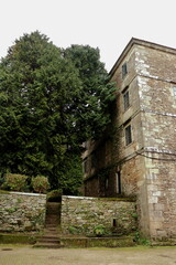 Galician stone house in the Park of Santo Domingo de Bonaval, in Santiago de Compostela. Vertical image.